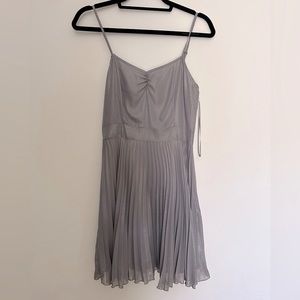 Topshop NWT silver dress size 6. Spaghetti strap with pleats.